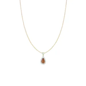 14 Karat Yellow Gold pendant with Orange Red Sapphire Pear Shape and diamond halo