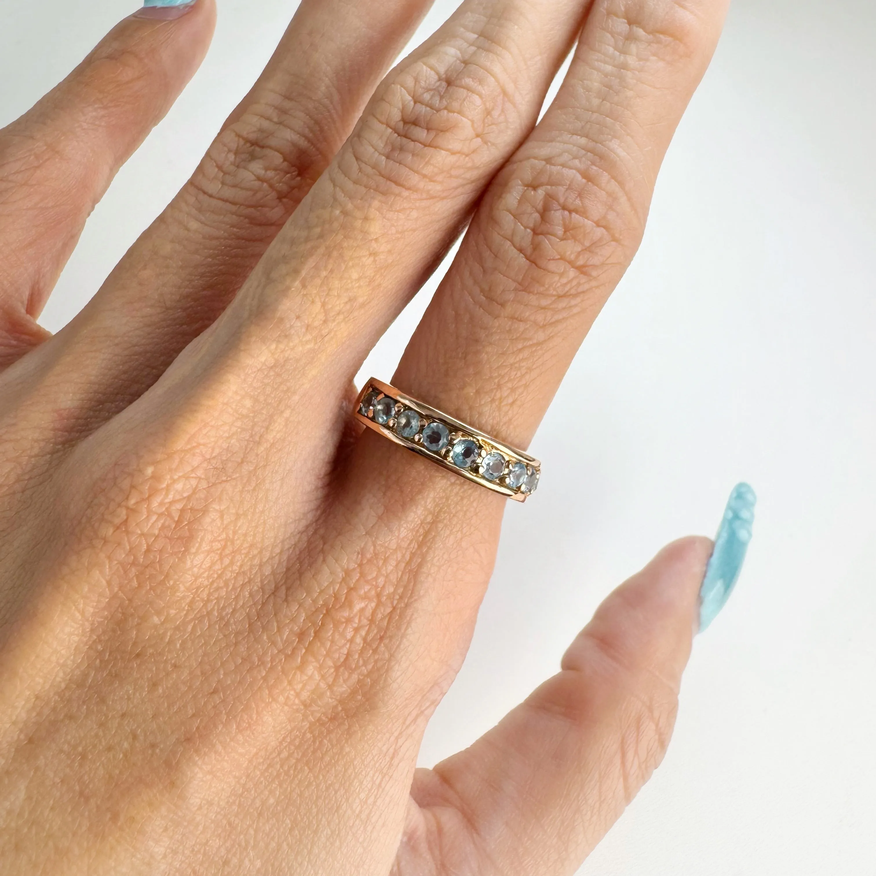 2.5 mm. Round Cut Sky Blue Brazilian Topaz Half Eternity Ring