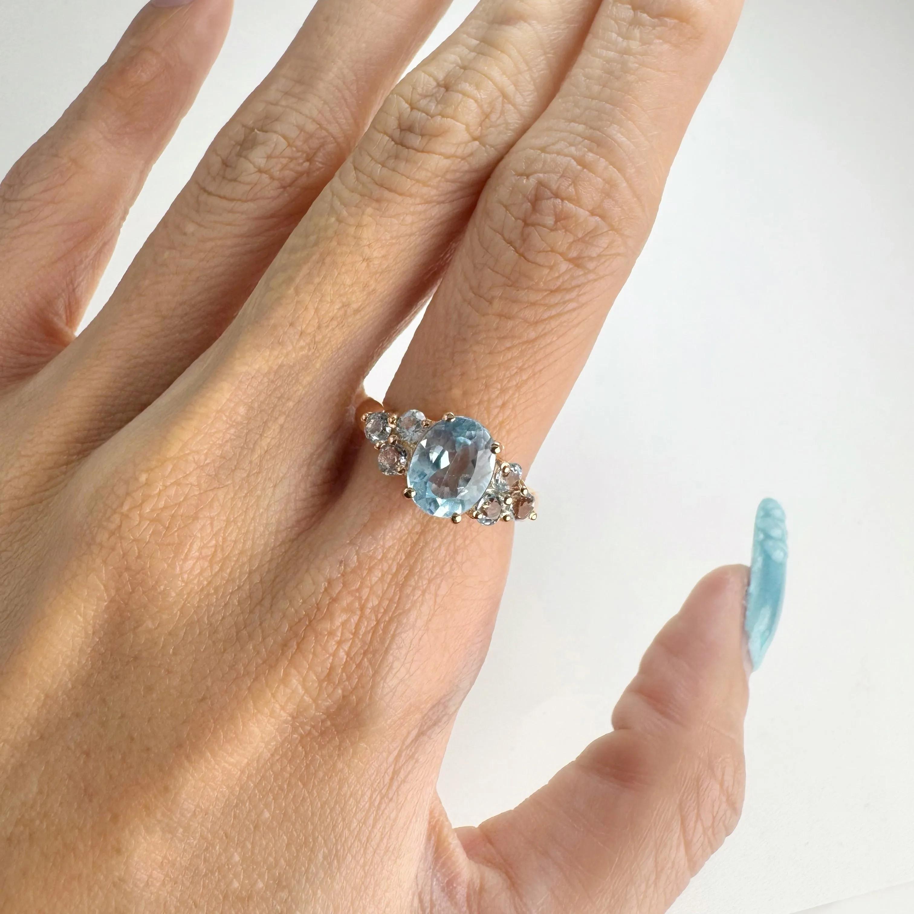 7 x 9 mm. Oval Cut Sky Blue Brazilian Topaz Cluster Ring