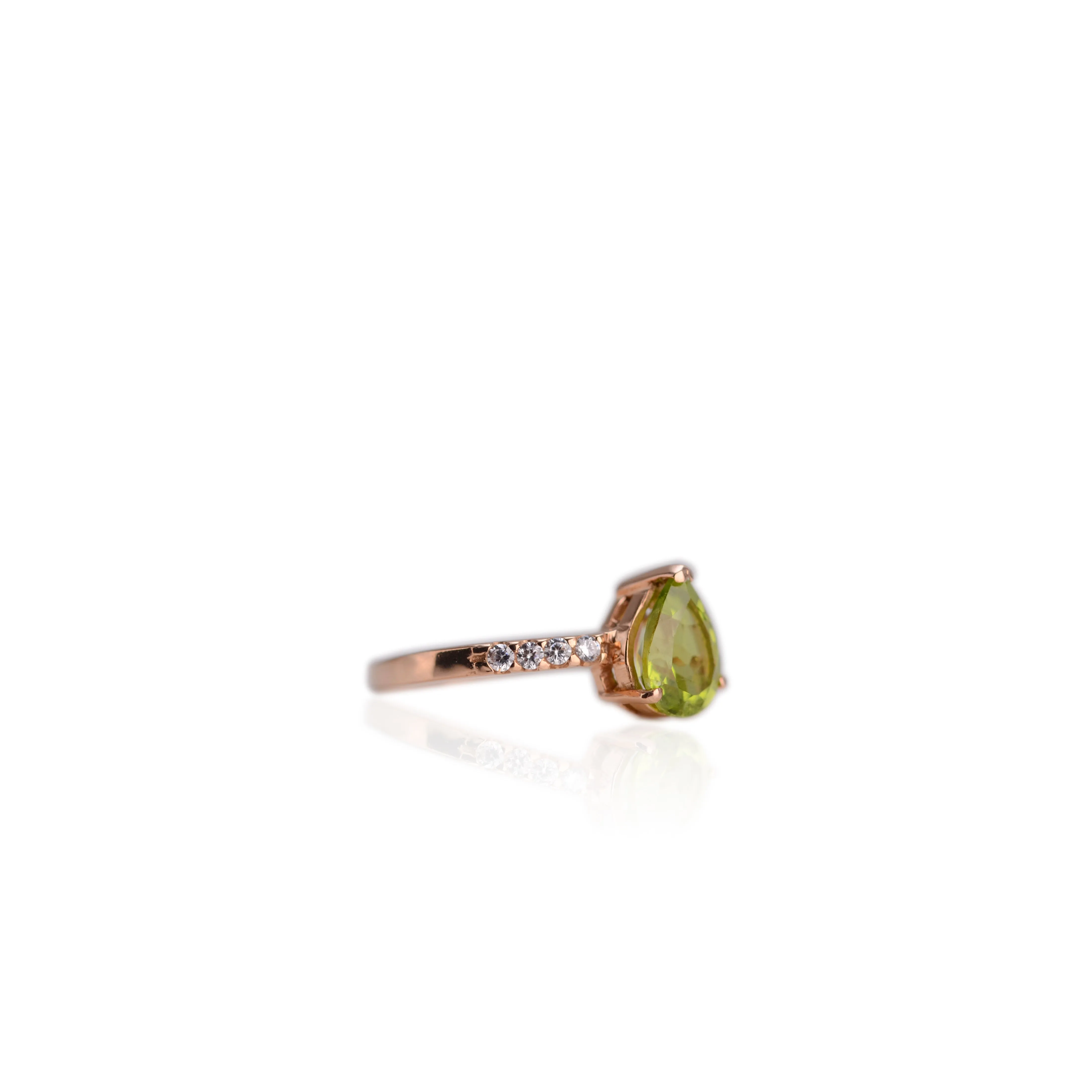7 x 9 mm. Pear Cut Green Pakistani Peridot with Cz Accents Ring