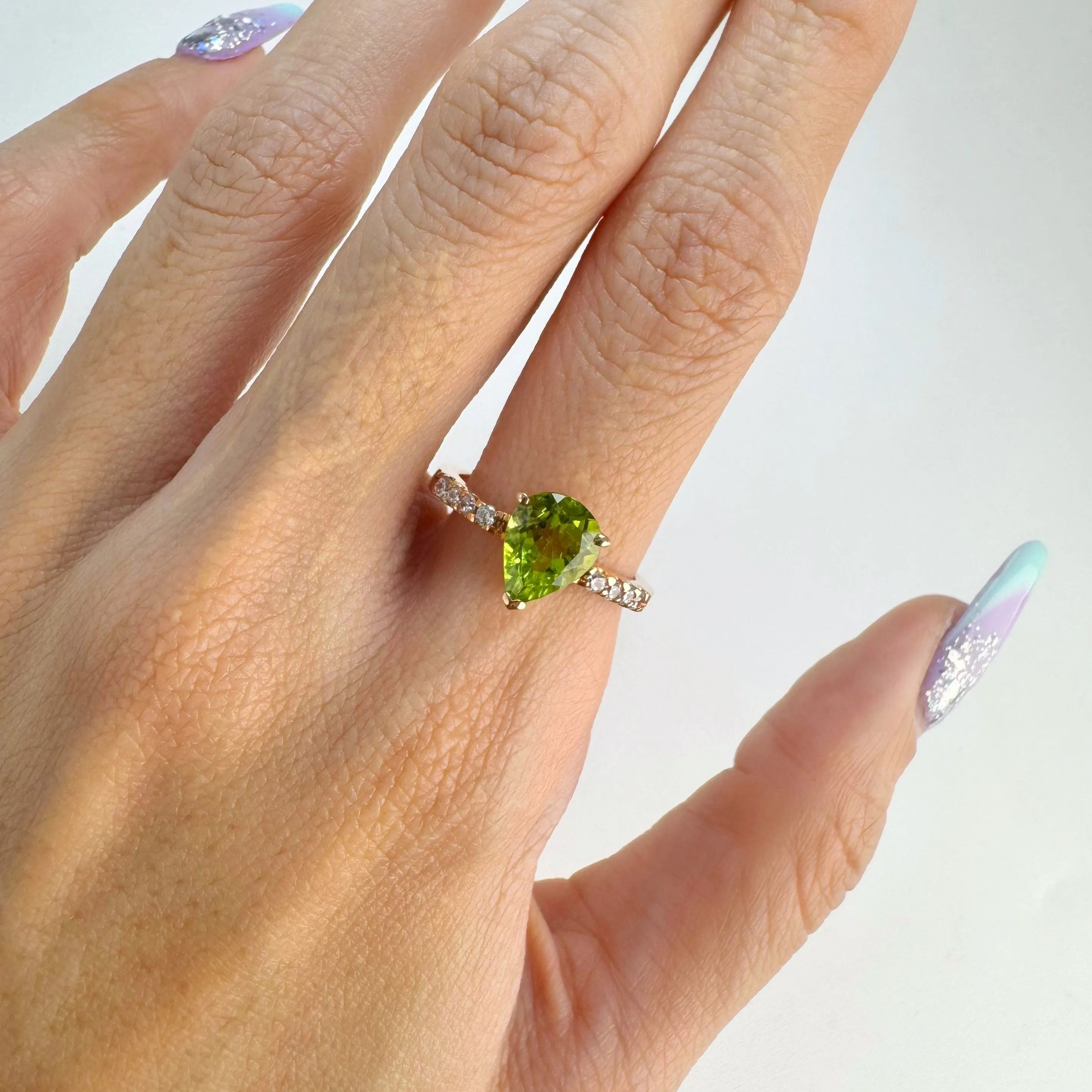 7 x 9 mm. Pear Cut Green Pakistani Peridot with Cz Accents Ring