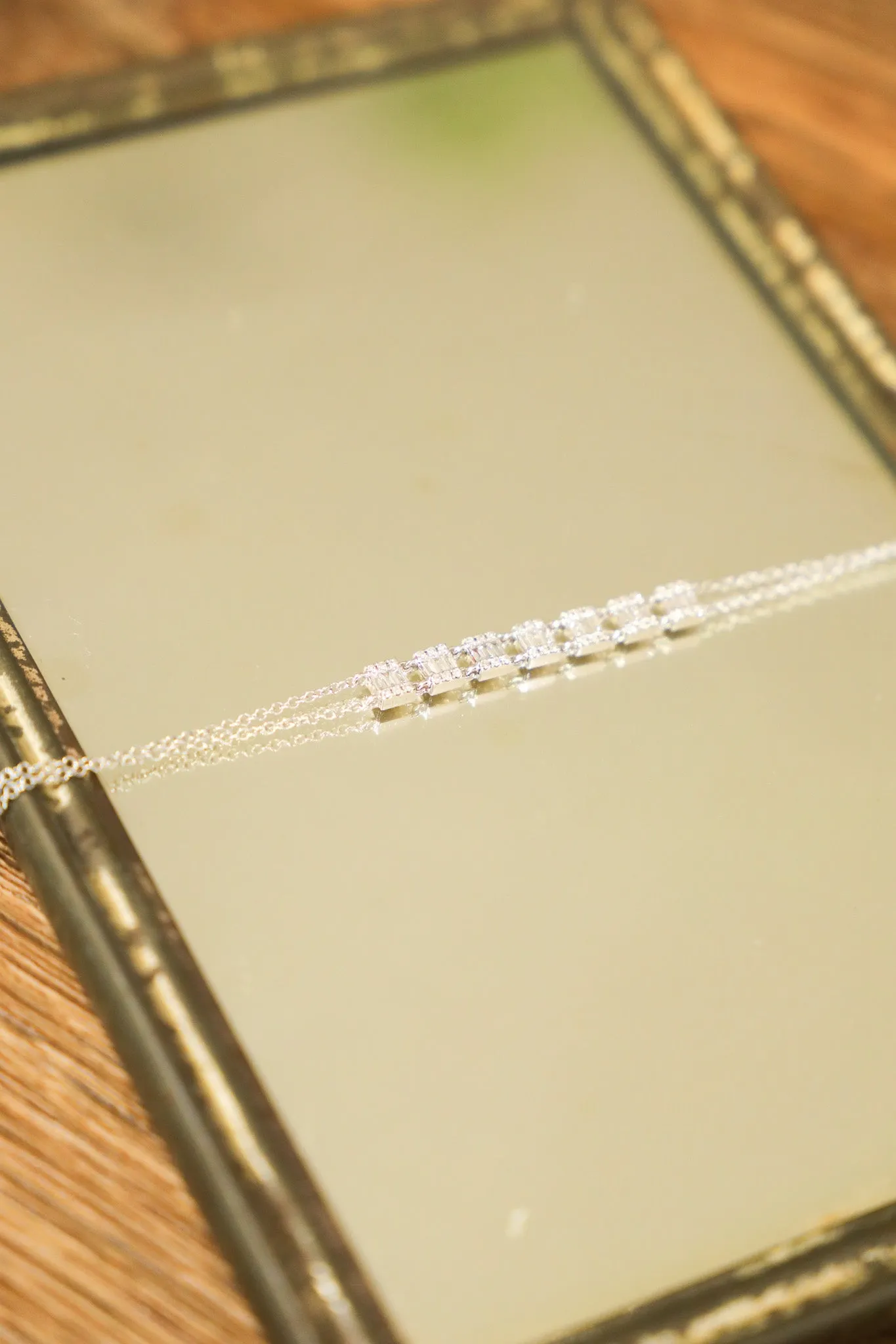 B037 - 14k WG Bracelet w/42 Round Diamonds 0.12cts & 23 Baguette Diamonds 0.33cts