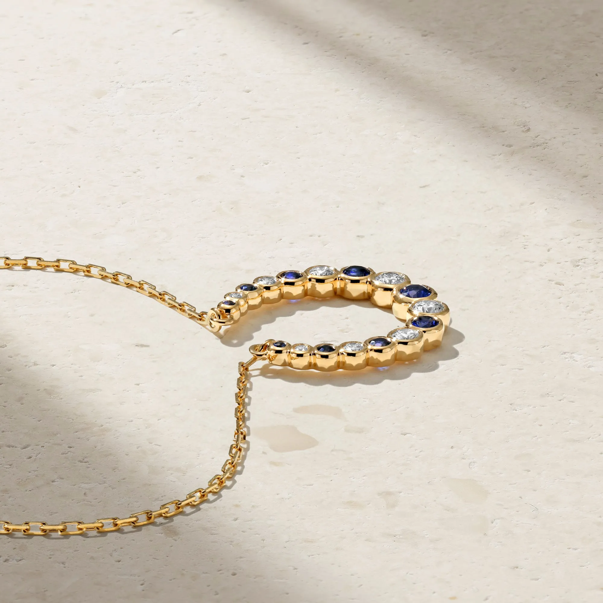 Bubbly Horseshoe Sapphire and Diamond Pendant