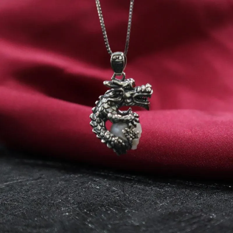Dragon Holding Pearl Skull Pendant Necklace