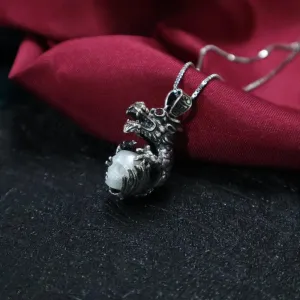 Dragon Holding Pearl Skull Pendant Necklace