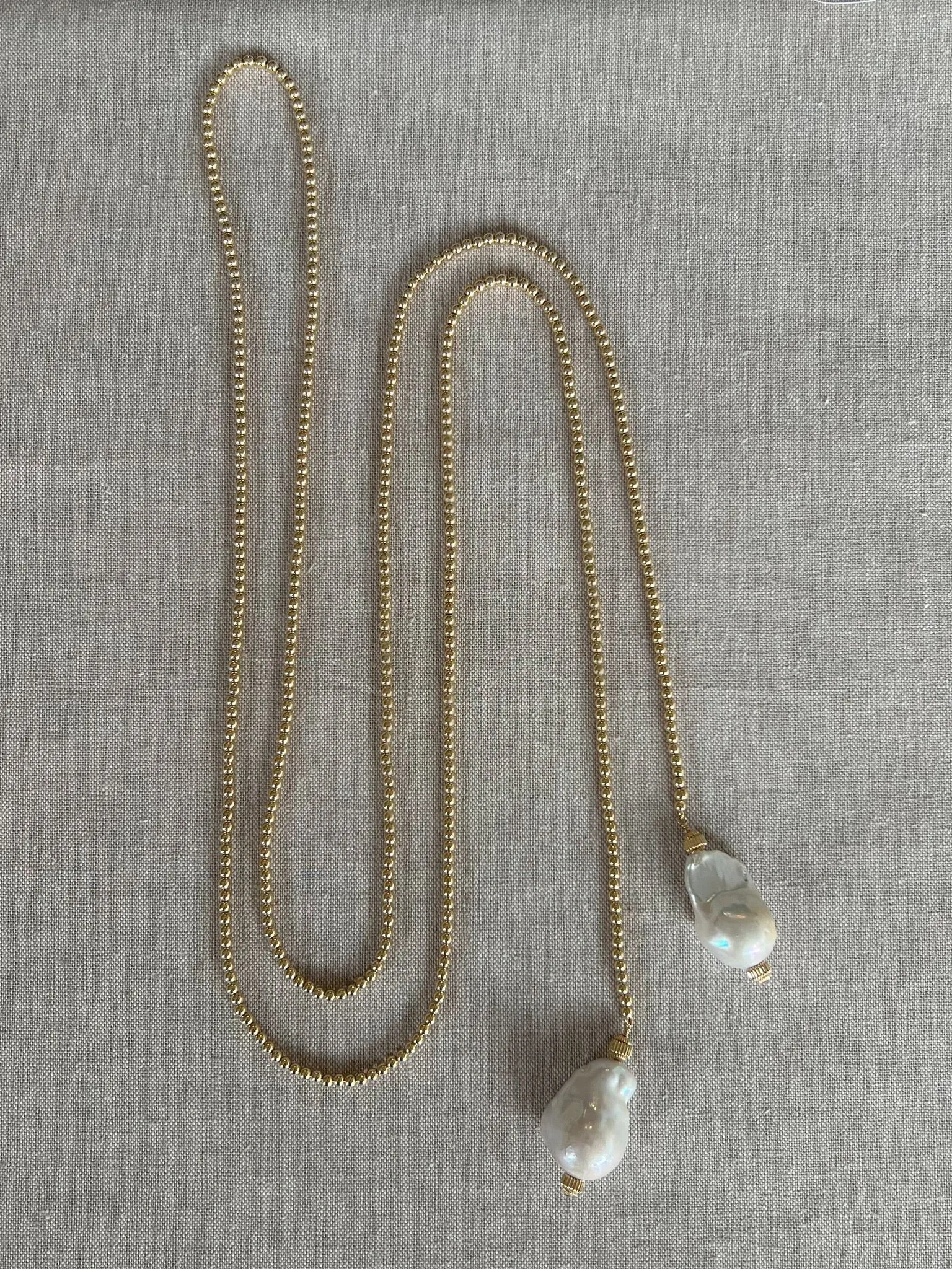 Gold Bead Lariat Necklace with Baroque Pearl Ends