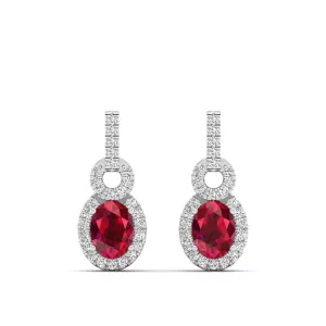 Oval Ruby and Halo Diamond Dangle Drop Earrings