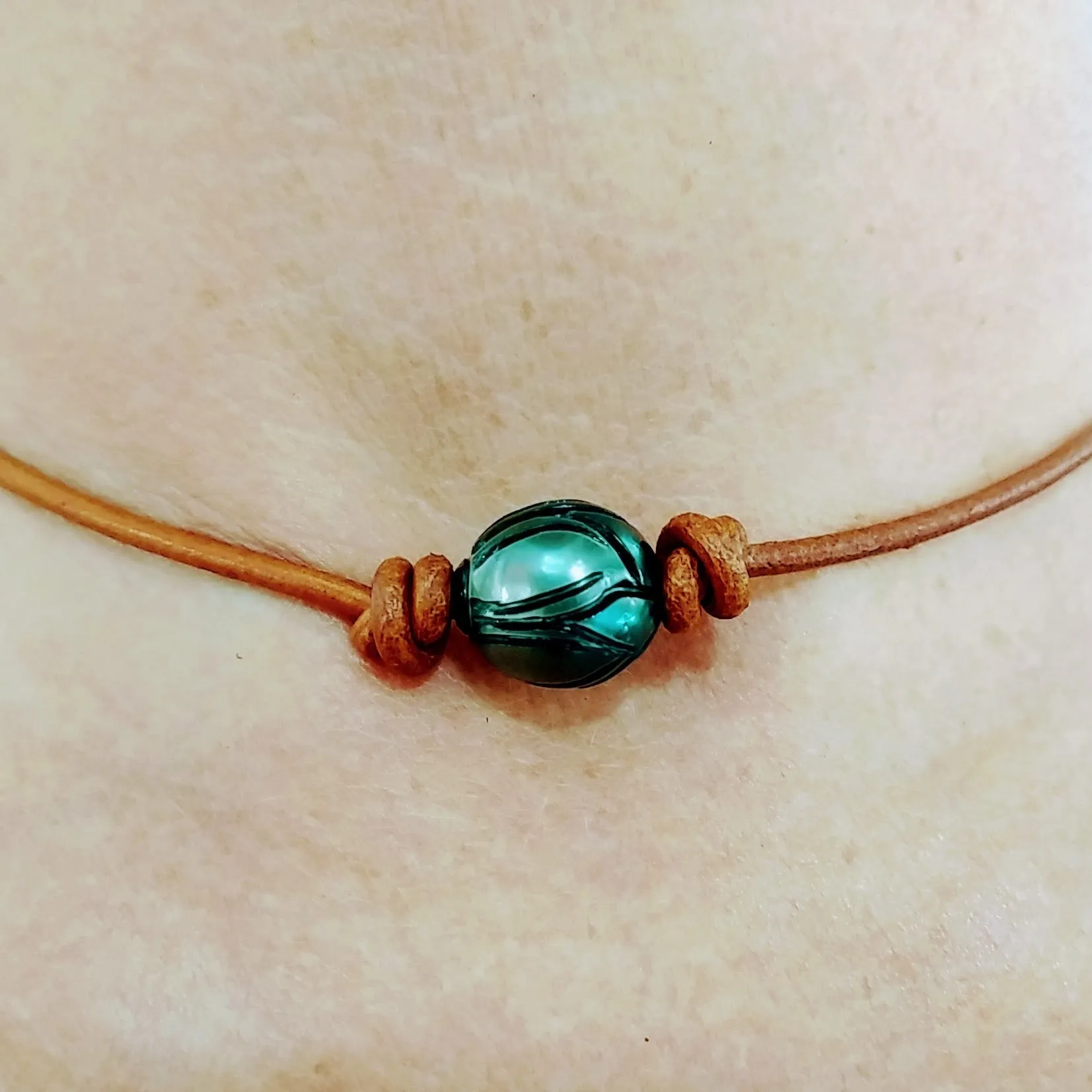 "Lotus Tattoo" Necklaces - Carved Tahitian Pearls, Leather