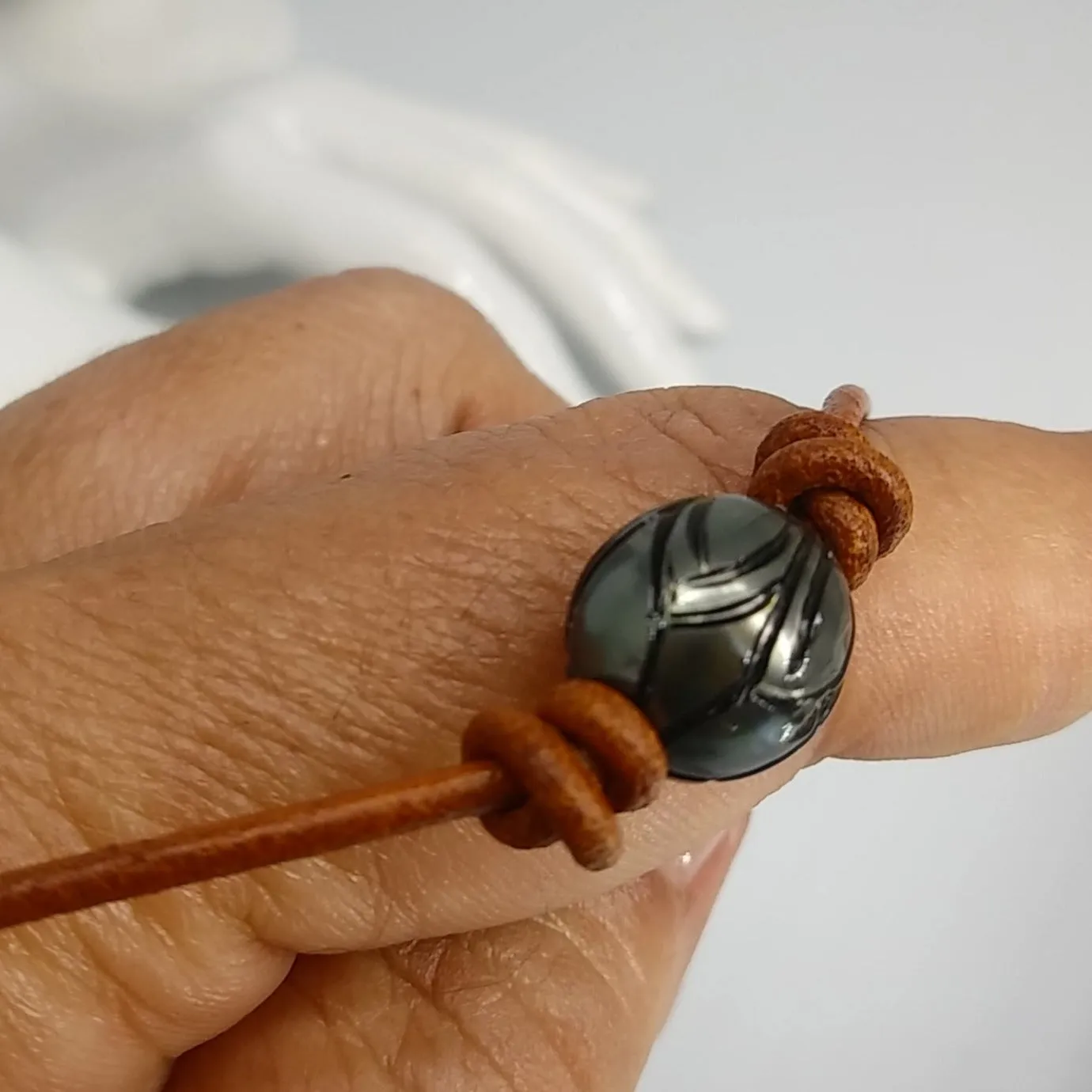 "Lotus Tattoo" Necklaces - Carved Tahitian Pearls, Leather