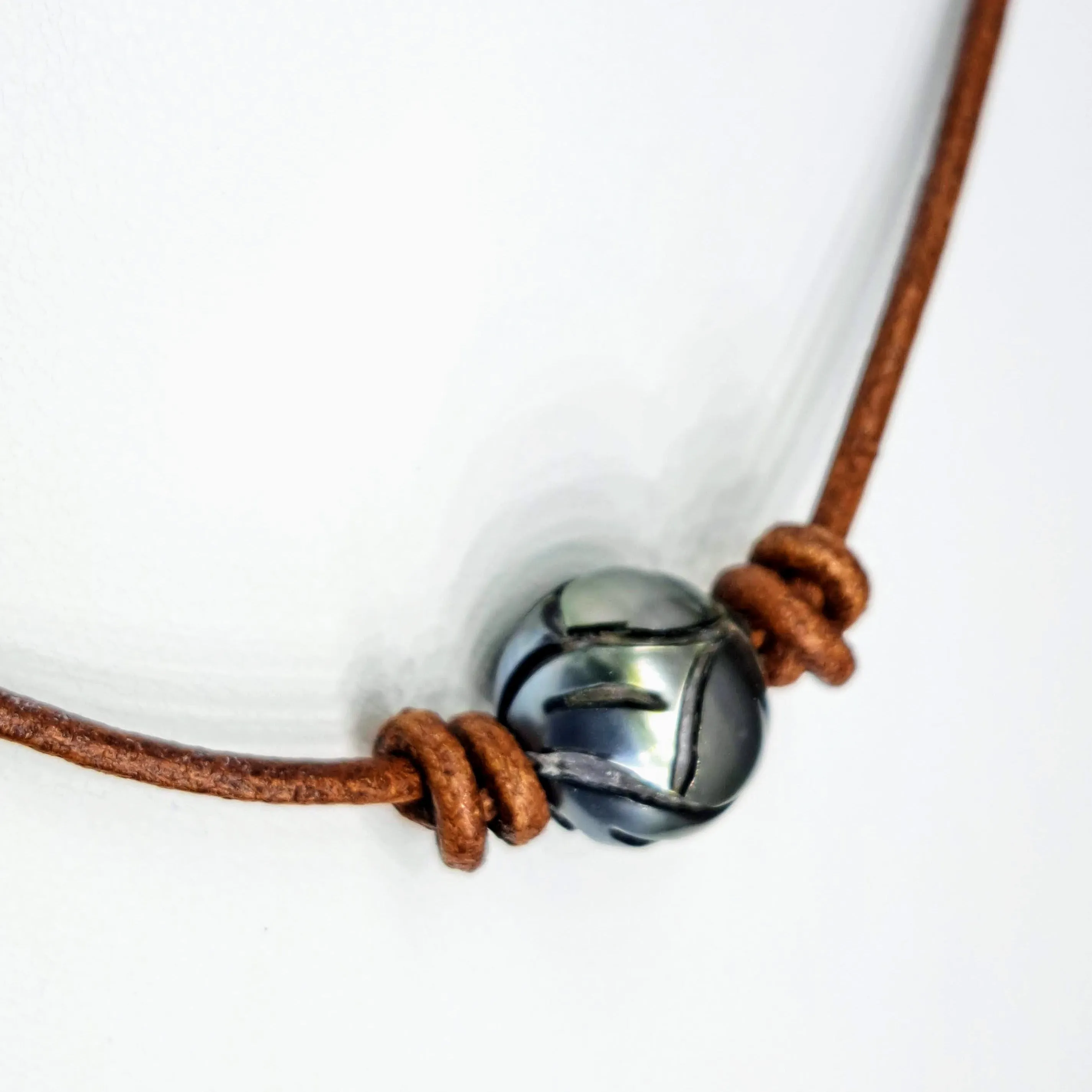"Lotus Tattoo" Necklaces - Carved Tahitian Pearls, Leather