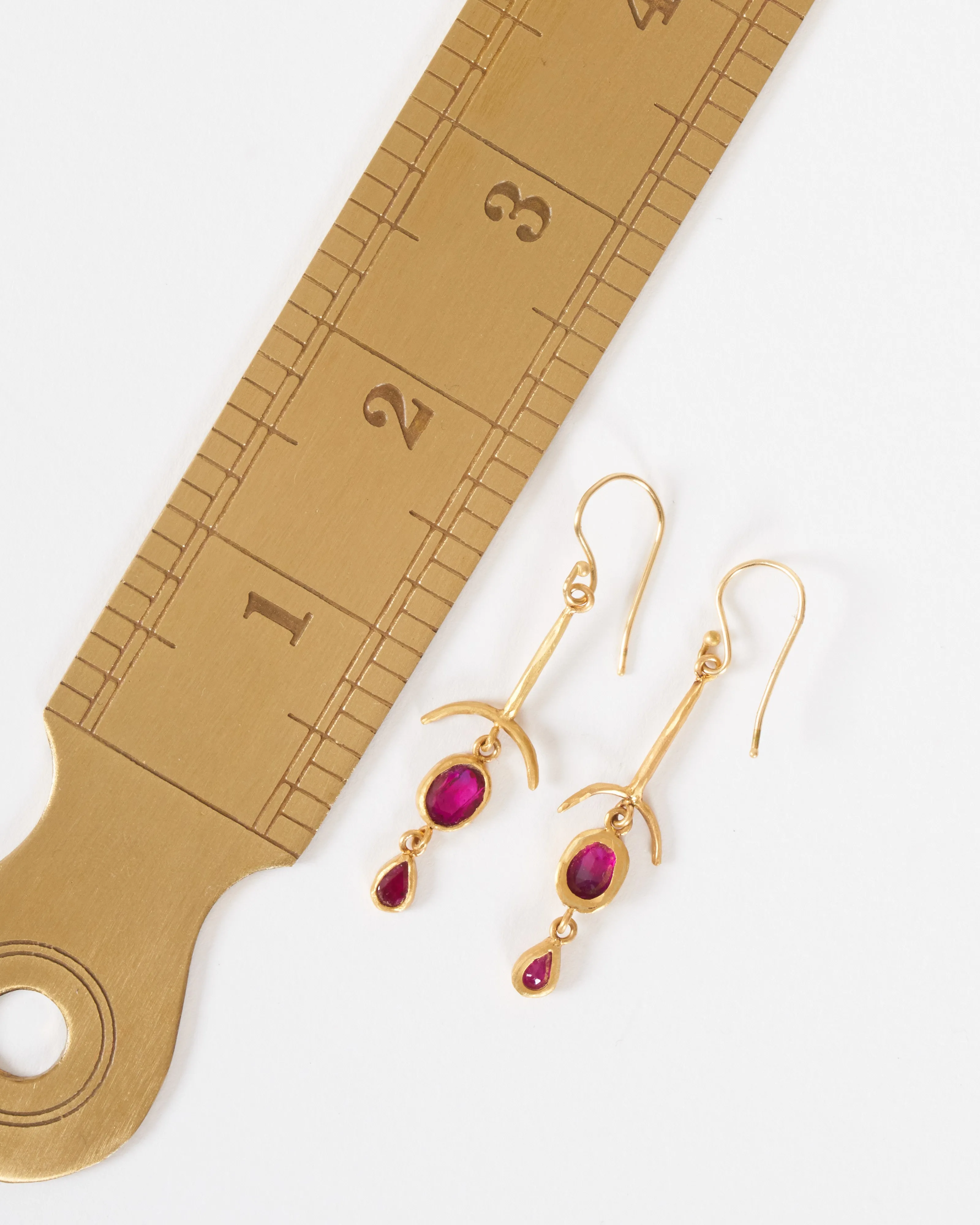 ruby drop bone earrings