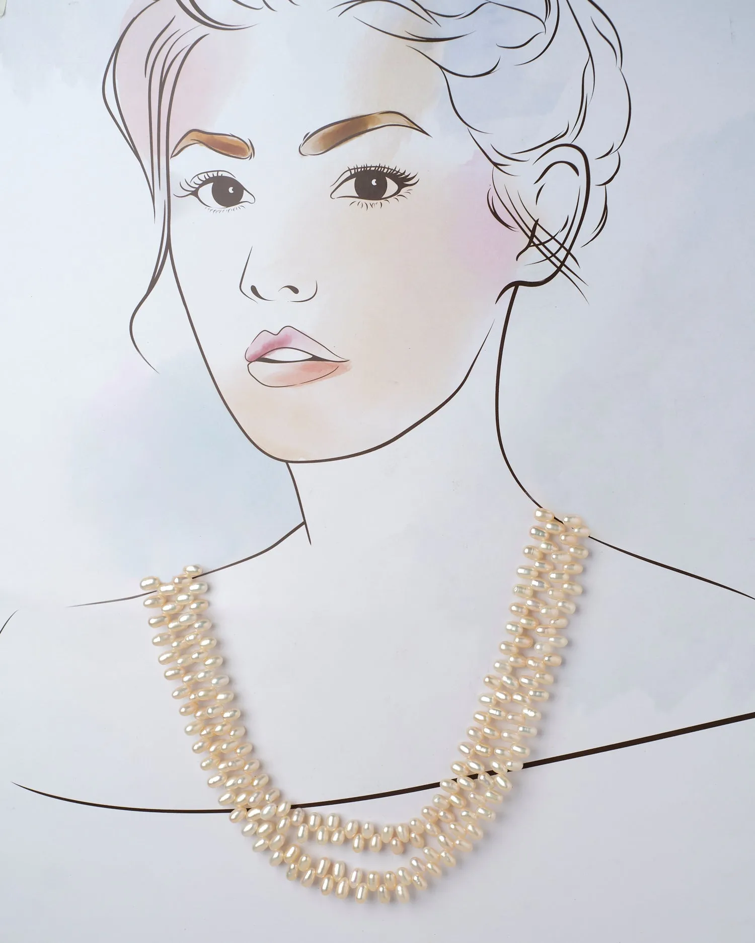 The Lavish Layers Of Elegance Pearl Necklace