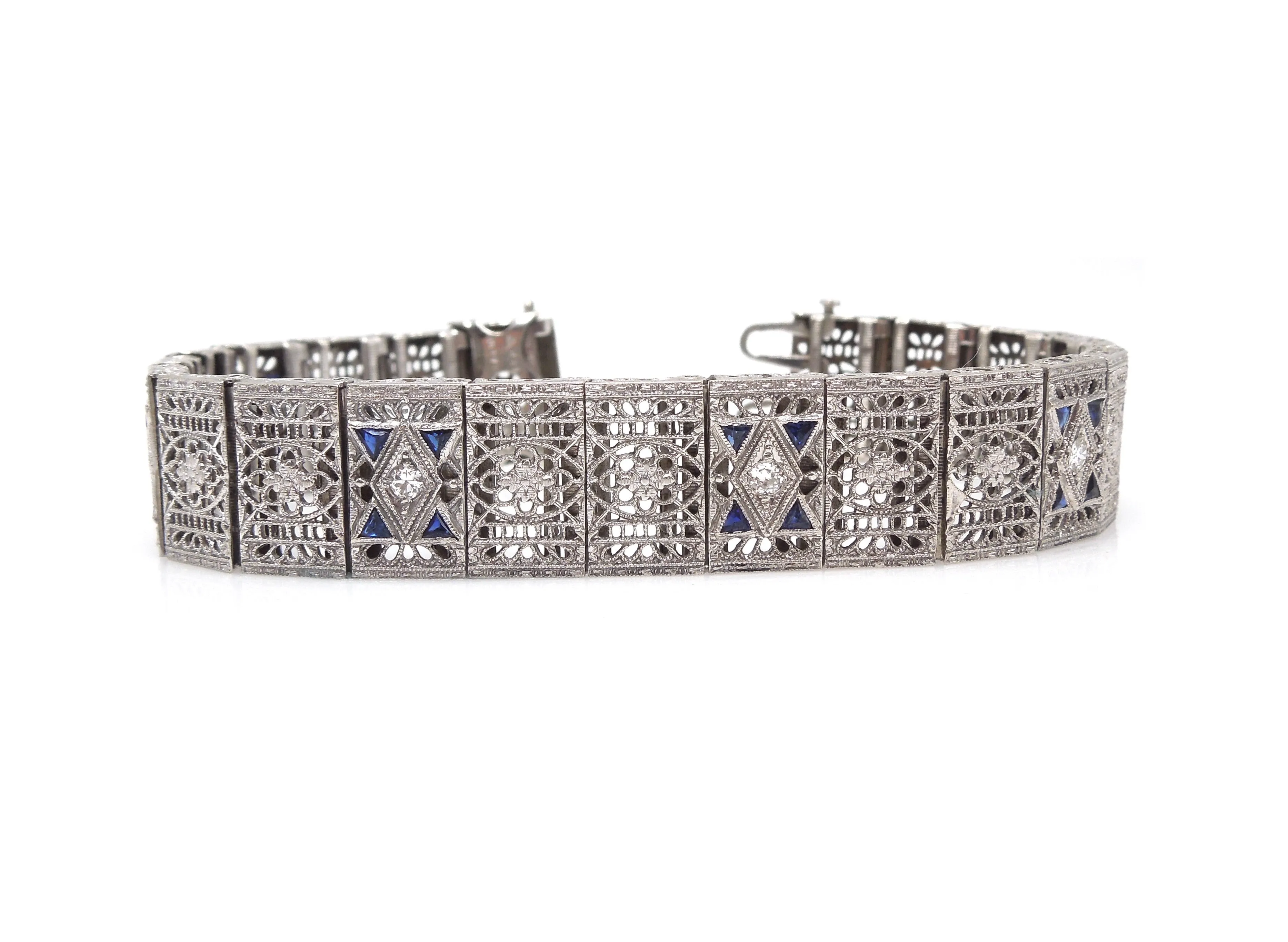 Wide Antique Art Deco Platinum and White Gold Filigree Link Bracelet with Diamonds and Sapphires