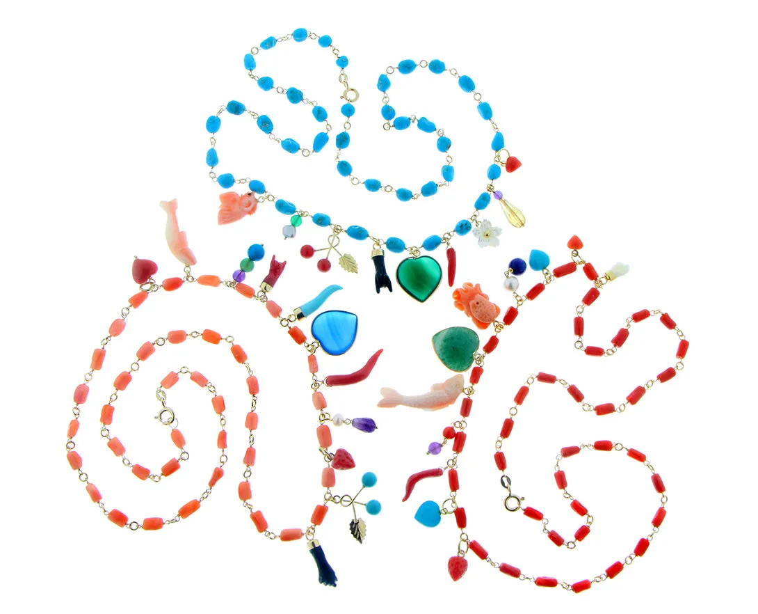 Yellow gold coral or turquois necklaces with charms